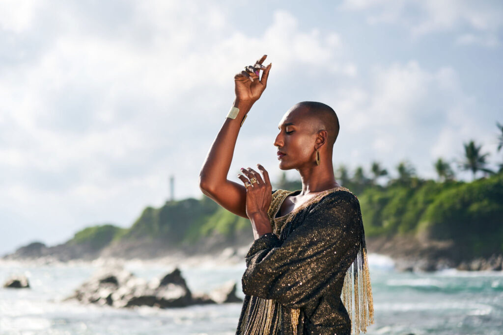 Elegant androgenous person on Beach