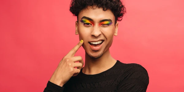 LGBTQ Youth with rainbow eyeshadow